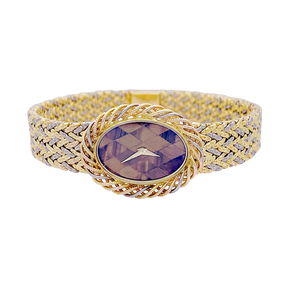 Montre Vacheron Constantin, trois ors et oeil de tigre
