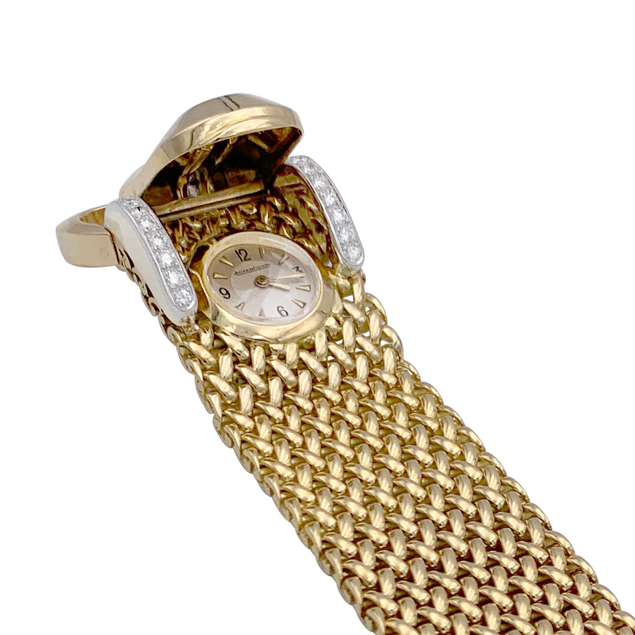 Montre  secrète Jaeger Lecoultre, or jaune, diamants.