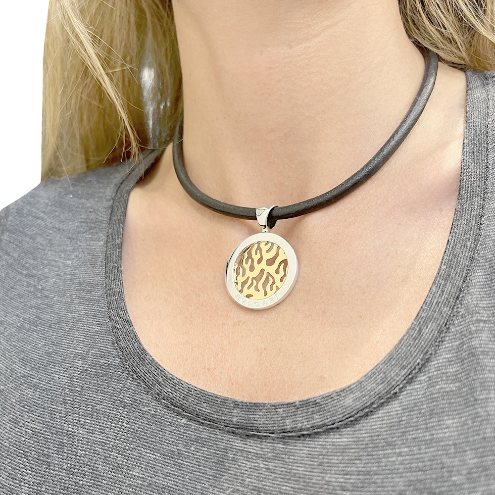 Bulgari pendant, "Tondo Fire", steel, yellow gold.
