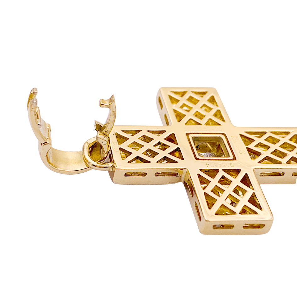 Chopard "Cross" pendant in yellow gold and diamonds.