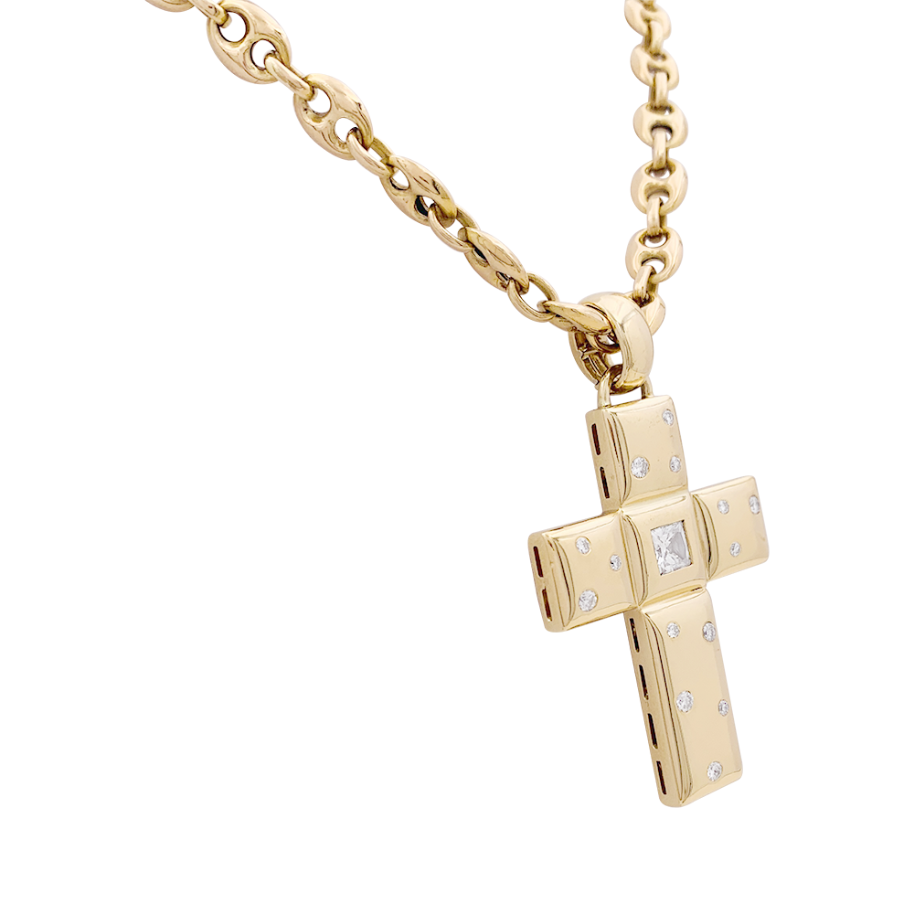 Chopard "Cross" pendant in yellow gold and diamonds.