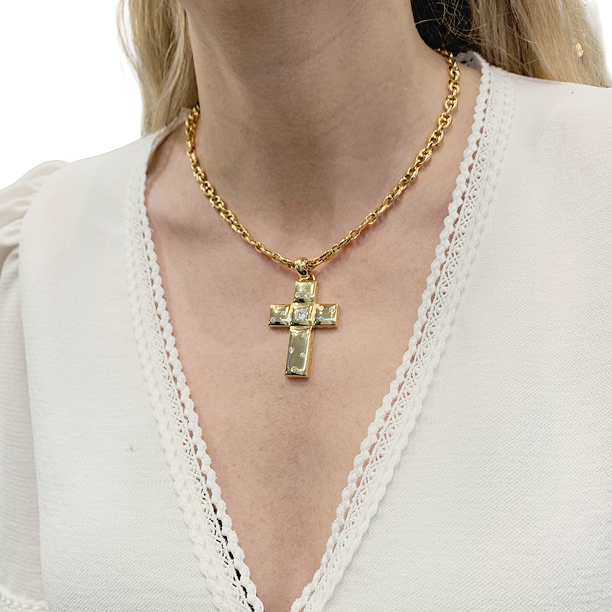 Chopard "Cross" pendant in yellow gold and diamonds.