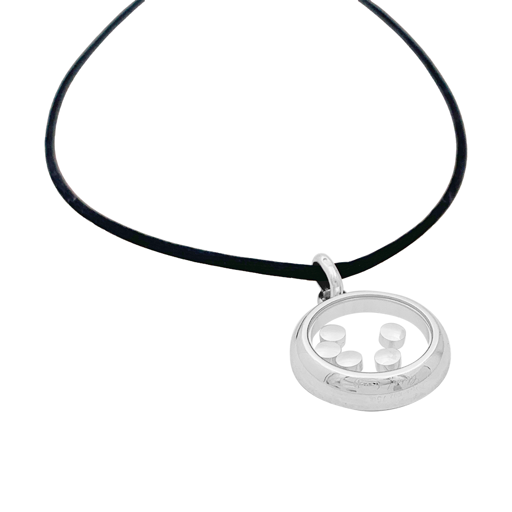 Chopard "Happy Diamonds" pendant in white gold and diamonds.