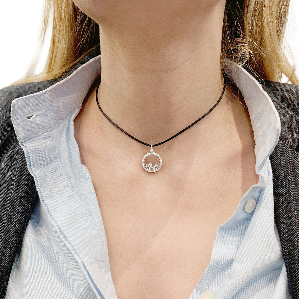 Chopard "Happy Diamonds" pendant in white gold and diamonds.