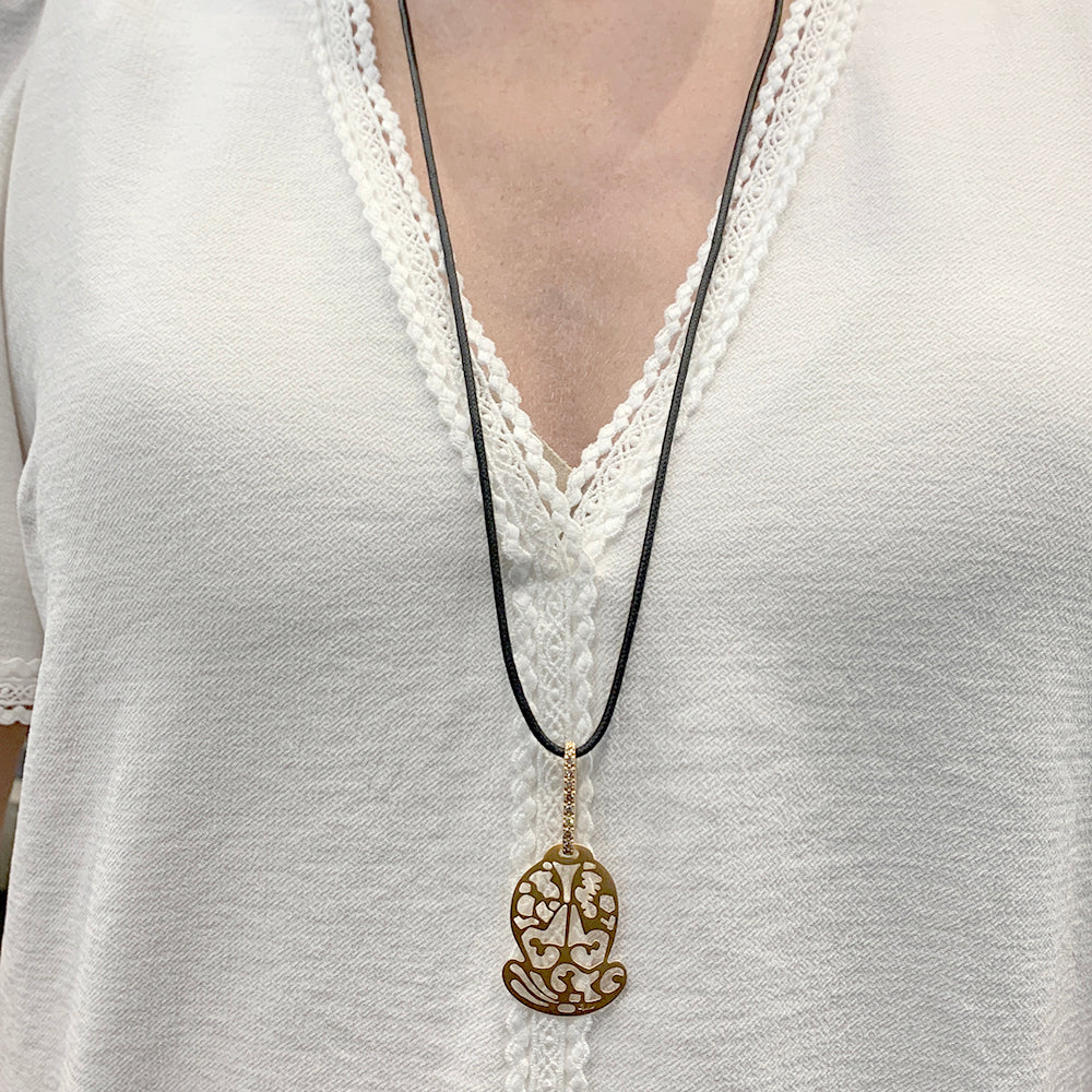 Pomellato pendant, “Ming”, pink gold, brown diamonds.
