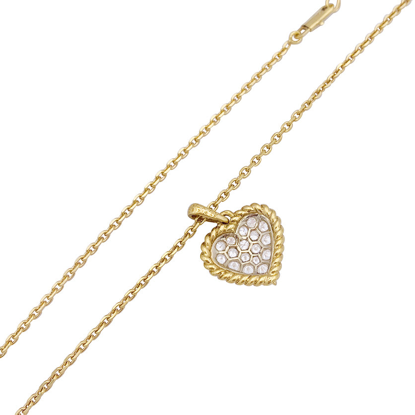 Vintage Van Cleef & Arpels "Heart" pendant, yellow gold, diamonds.