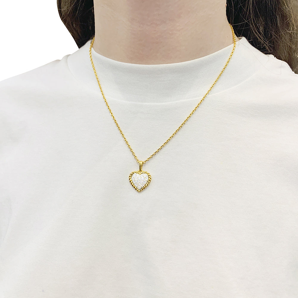 Vintage Van Cleef & Arpels "Heart" pendant, yellow gold, diamonds.