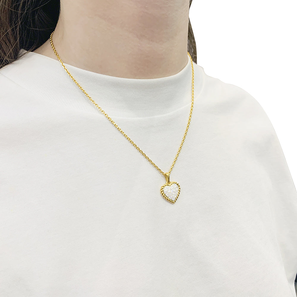 Vintage Van Cleef & Arpels "Heart" pendant, yellow gold, diamonds.