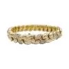 Fred bracelet in yellow gold and diamonds.