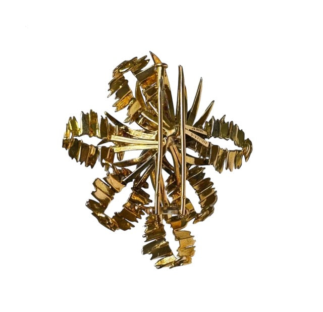 Mellerio 18k yellow gold brooch with emerald, rubies and diamonds