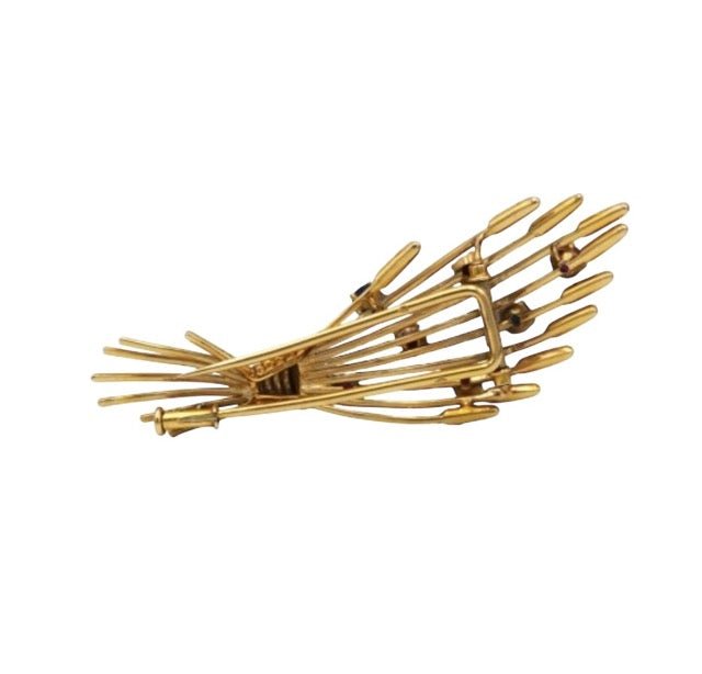 Mellerio, broche vintage en or jaune 18K rubis et saphirs - Maison Eloe