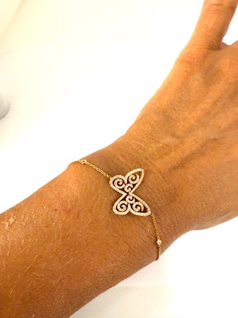 Messika bracelet Papillon arabesque en or rose et diamants - Maison Eloe