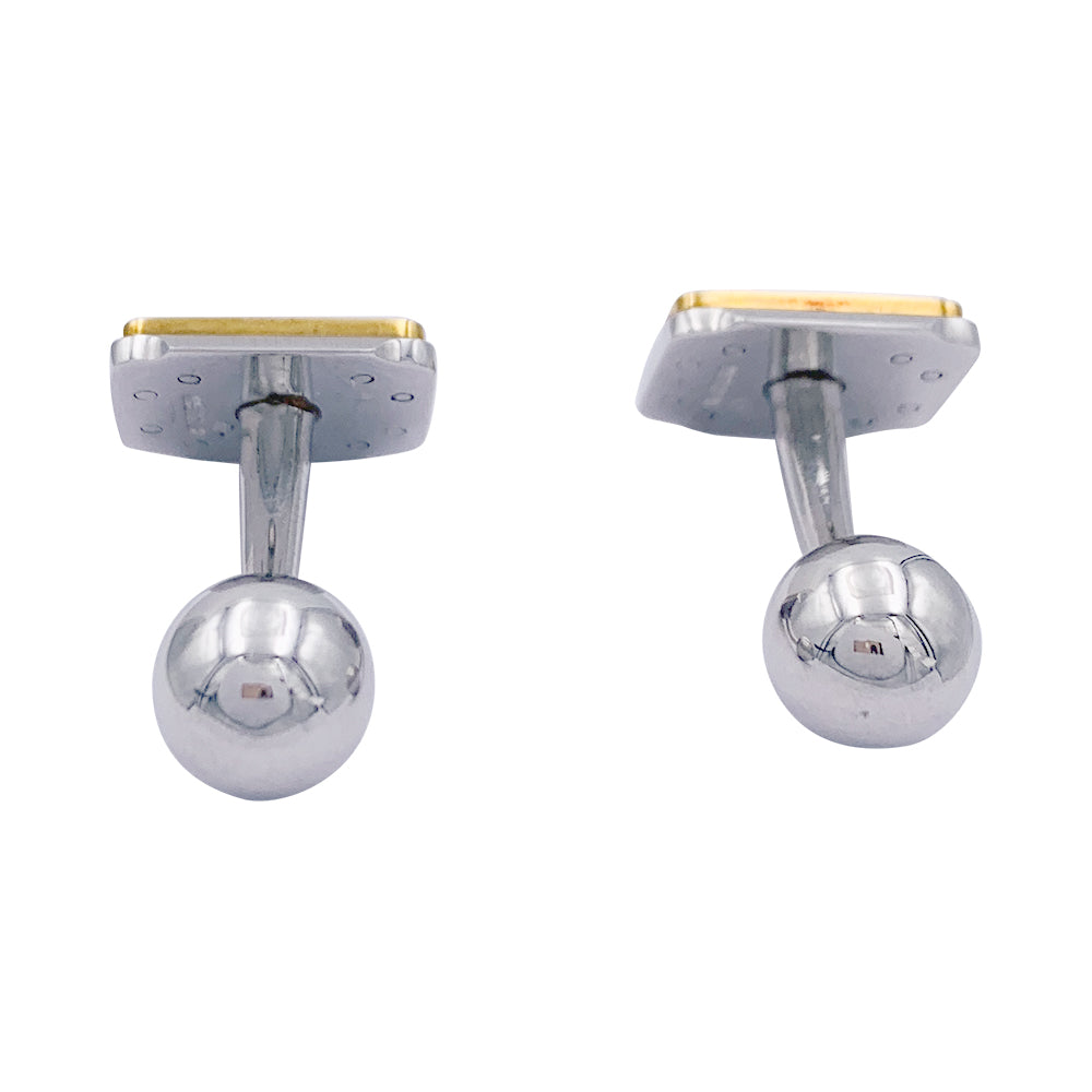 Boutons de manchette Cartier, "Santos Dumont", or et acier.