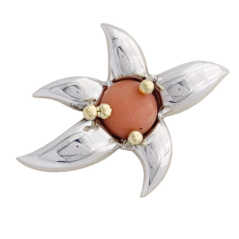 Tiffany & Co. set in silver, yellow gold, and coral.