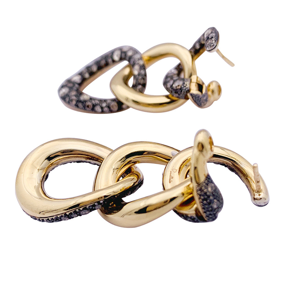 Pomellato "Tango" earrings in rose gold, silver and brown diamonds.