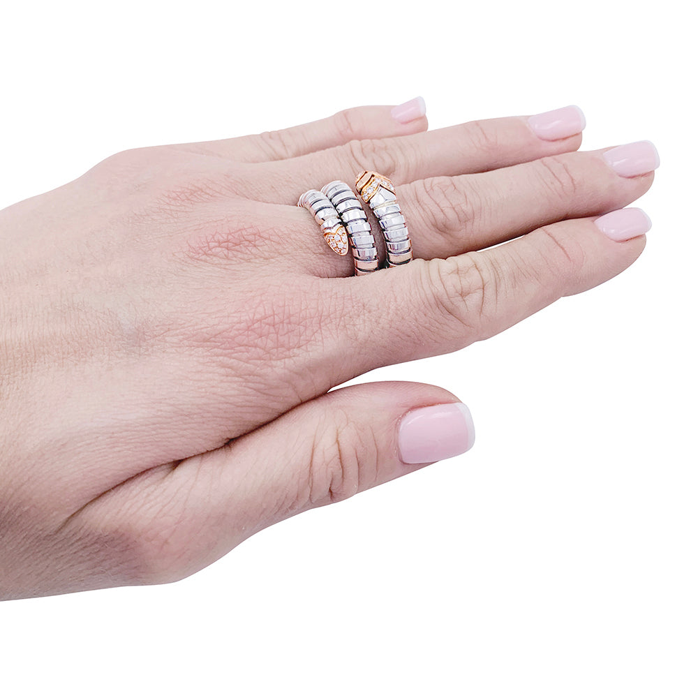 Bague Bulagri, "Serpenti", acier, or, diamants.