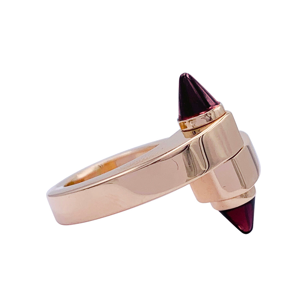 Cartier ring, "Menottes", pink gold, almandine garnets.