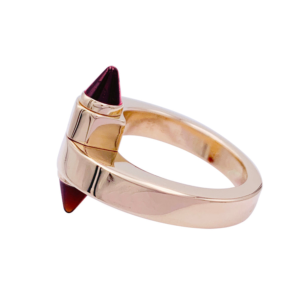 Cartier ring, "Menottes", pink gold, almandine garnets.
