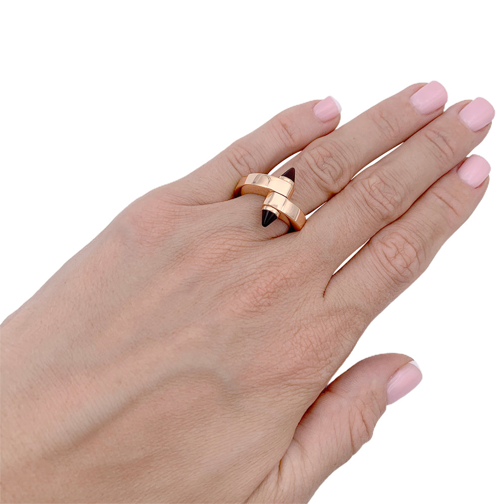 Cartier ring, "Menottes", pink gold, almandine garnets.