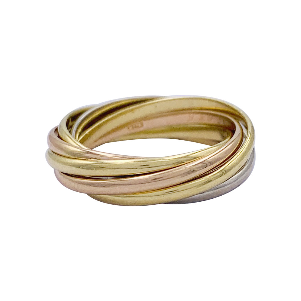 Bague Cartier, "Semainier", trois ors.