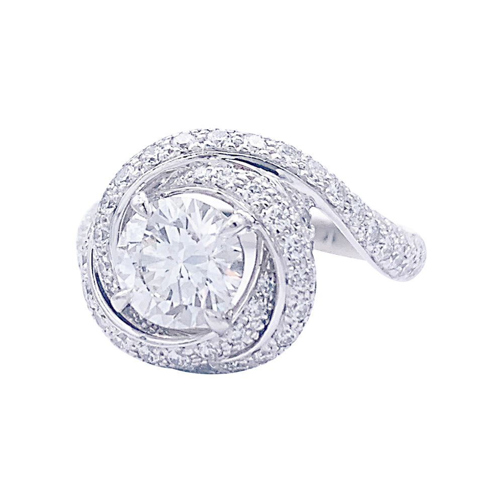 Cartier solitaire, "Trinity Ruban", platinum and diamonds.