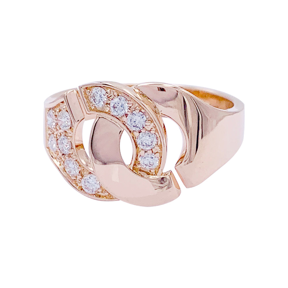 Bague Dinh Van, "Menottes R12", or rose, diamants.