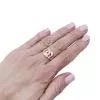Bague Dinh Van, "Menottes R12", or rose, diamants.