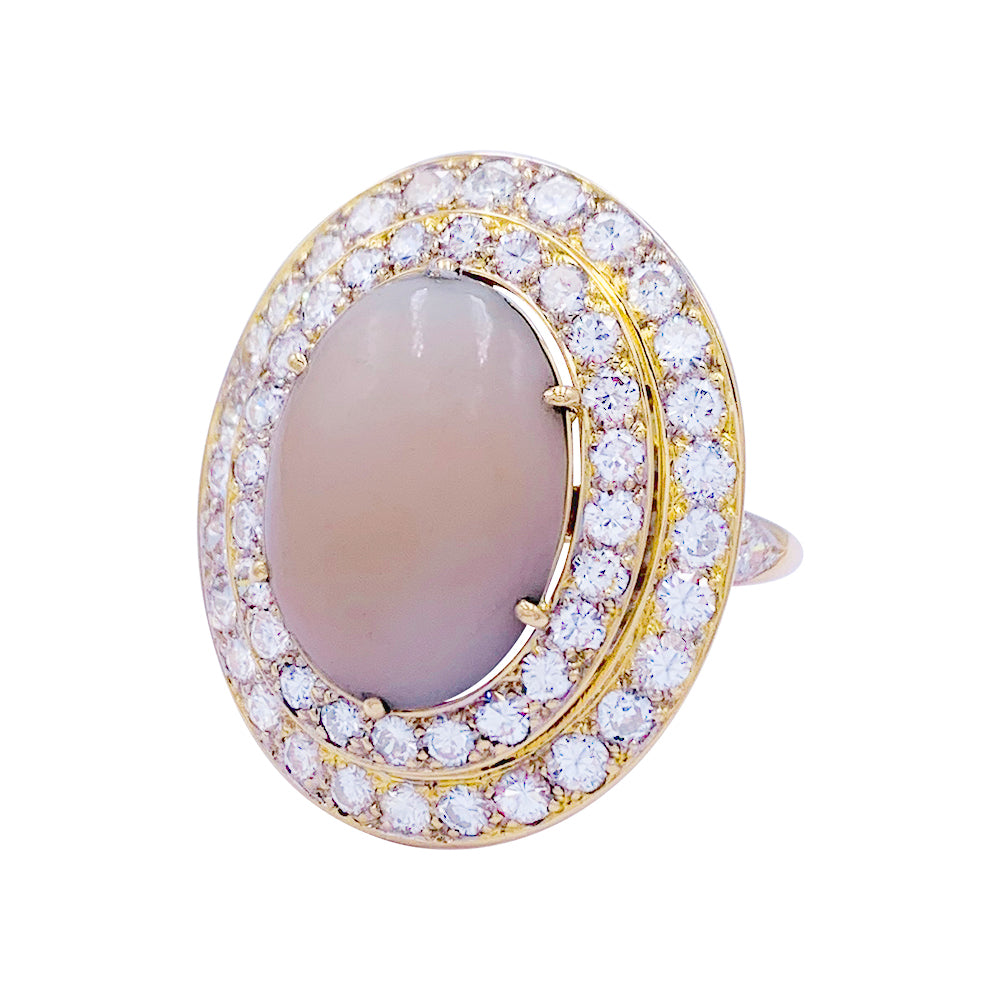 Bague M.Gérard corail, diamants.