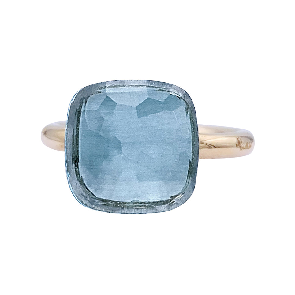 Pomellato ring, "Nudo Maxi", two golds and blue topaz.
