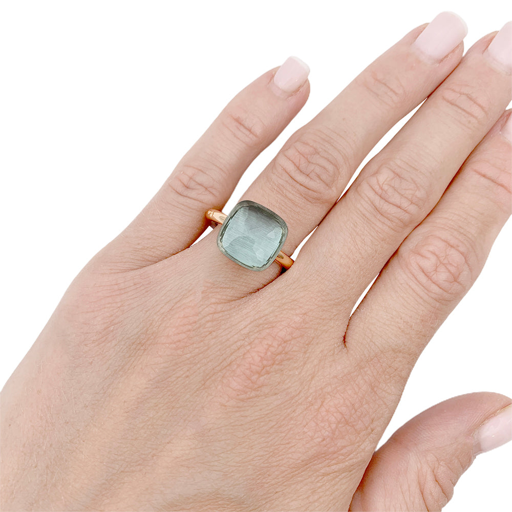 Pomellato ring, "Nudo Maxi", two golds and blue topaz.
