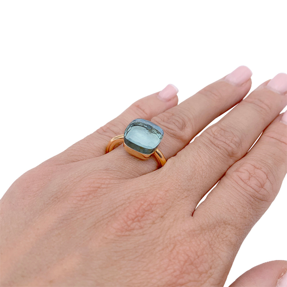 Pomellato ring, "Nudo Maxi", two golds and blue topaz.