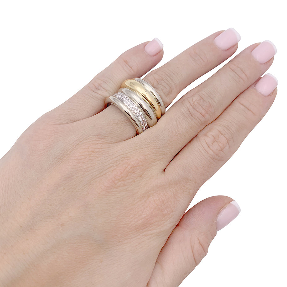 Pomellato ring, "Tubolare", two golds and diamonds.