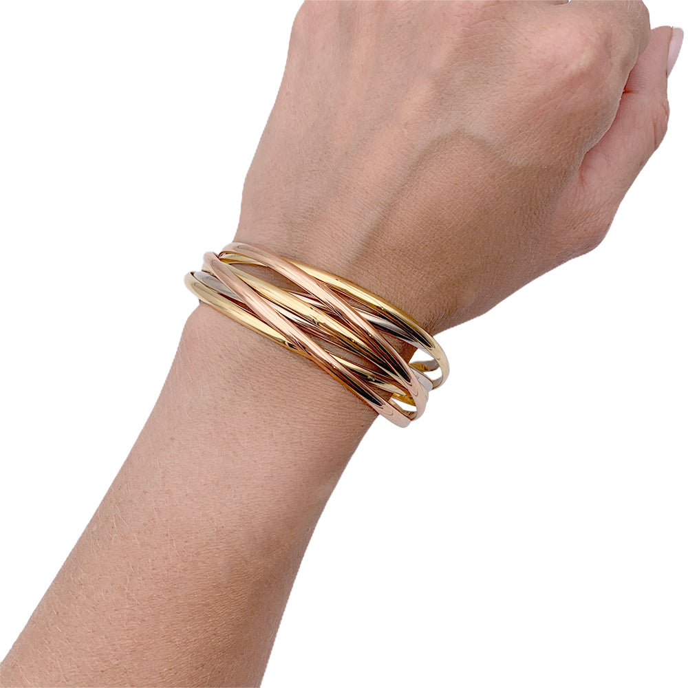 Cartier bracelet, "Trinity Semainier", three golds.