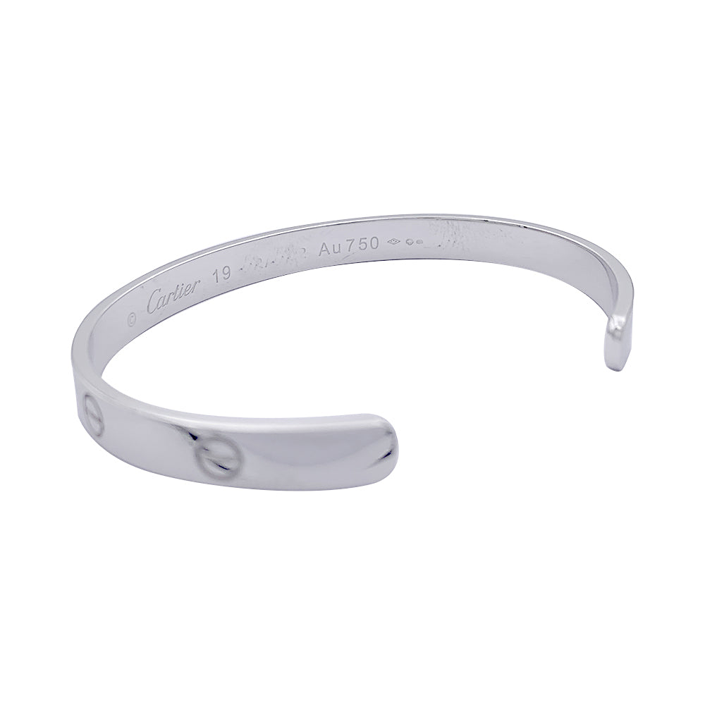 Bracelet Cartier, "Love", or blanc.
