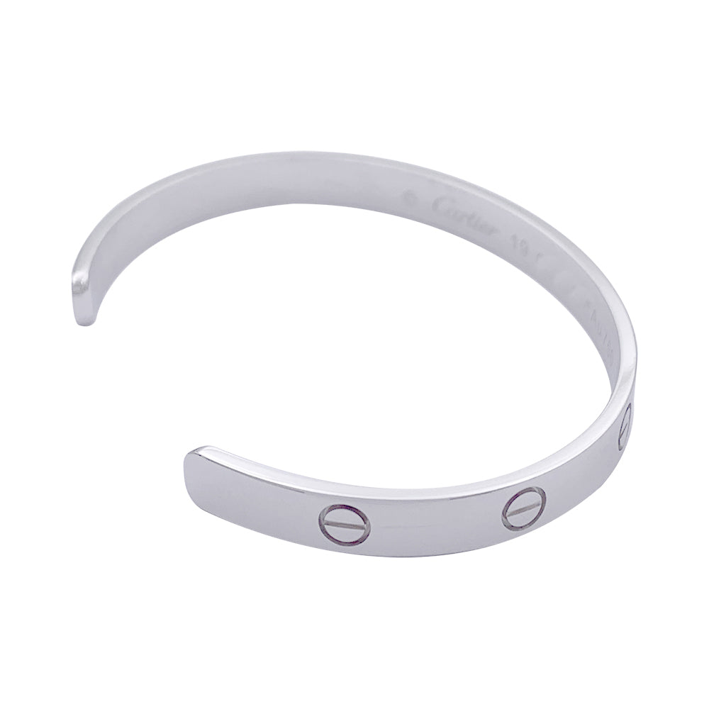 Bracelet Cartier, "Love", or blanc.
