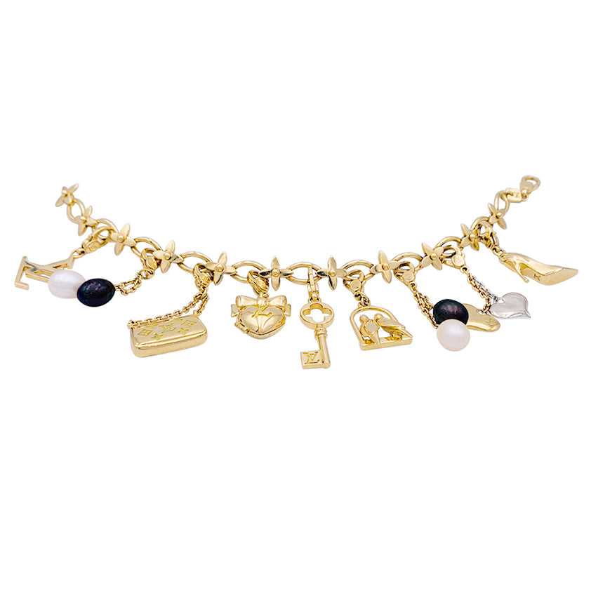 Bracelet Louis Vuitton, "Idylle",  breloques, or jaune, or blanc, perles.