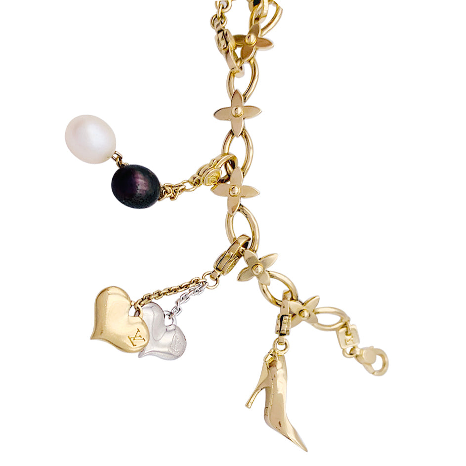 Bracelet Louis Vuitton, "Idylle",  breloques, or jaune, or blanc, perles.