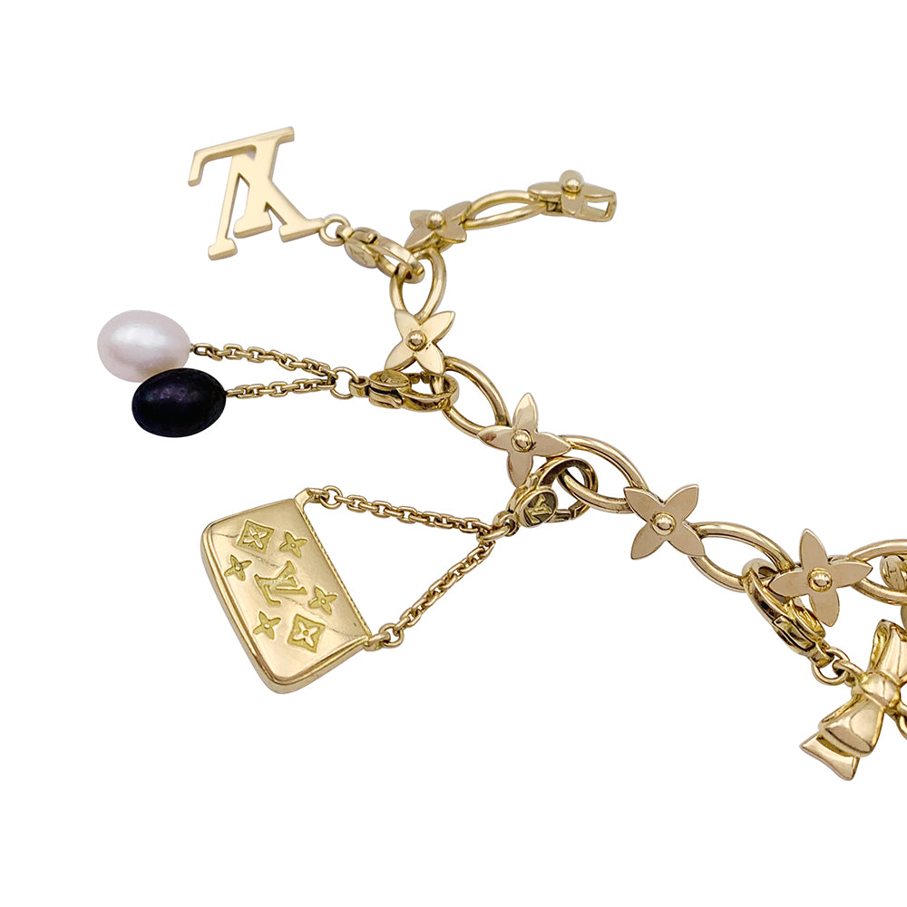 Bracelet Louis Vuitton, "Idylle",  breloques, or jaune, or blanc, perles.