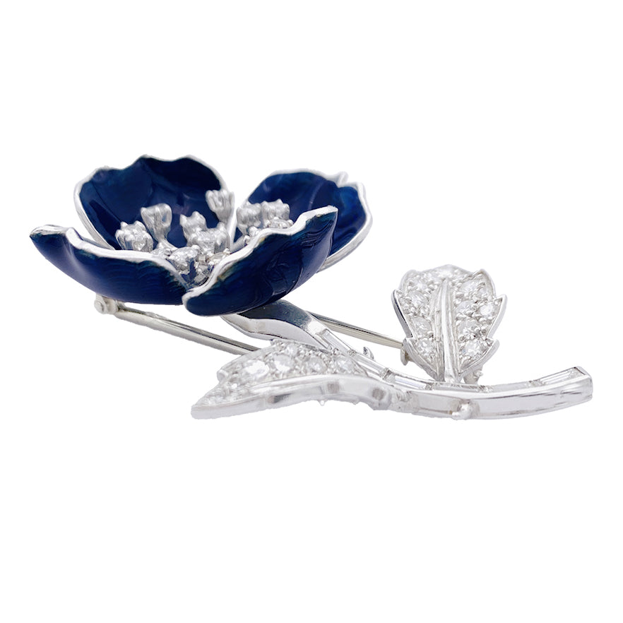 Clip Boucheron, "Eglantine", en or blanc, platine, émail et diamants.
