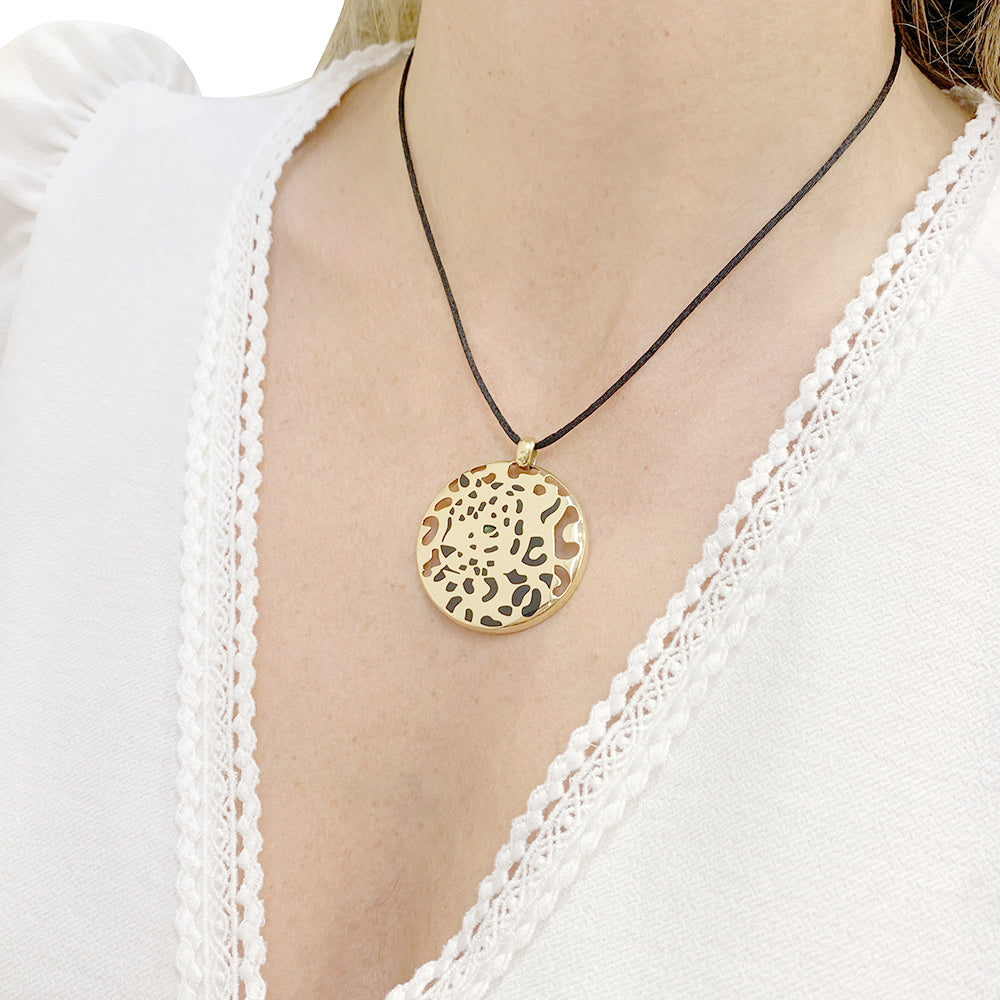 Pendentif Cartier,"Cartier Sauvage", en or jaune, émail et tsavorite.