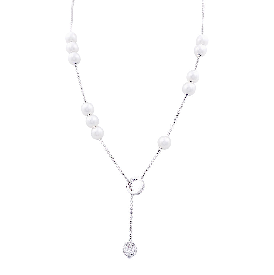 Mikimoto necklace in white gold, white pearls, diamonds.