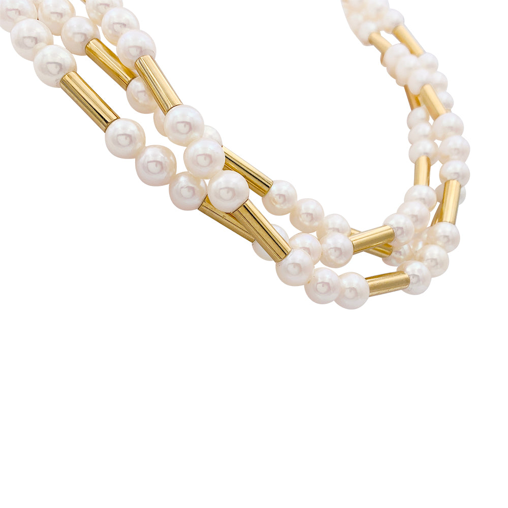 Poiray necklace, "Roseau" model, yellow gold, pearls.