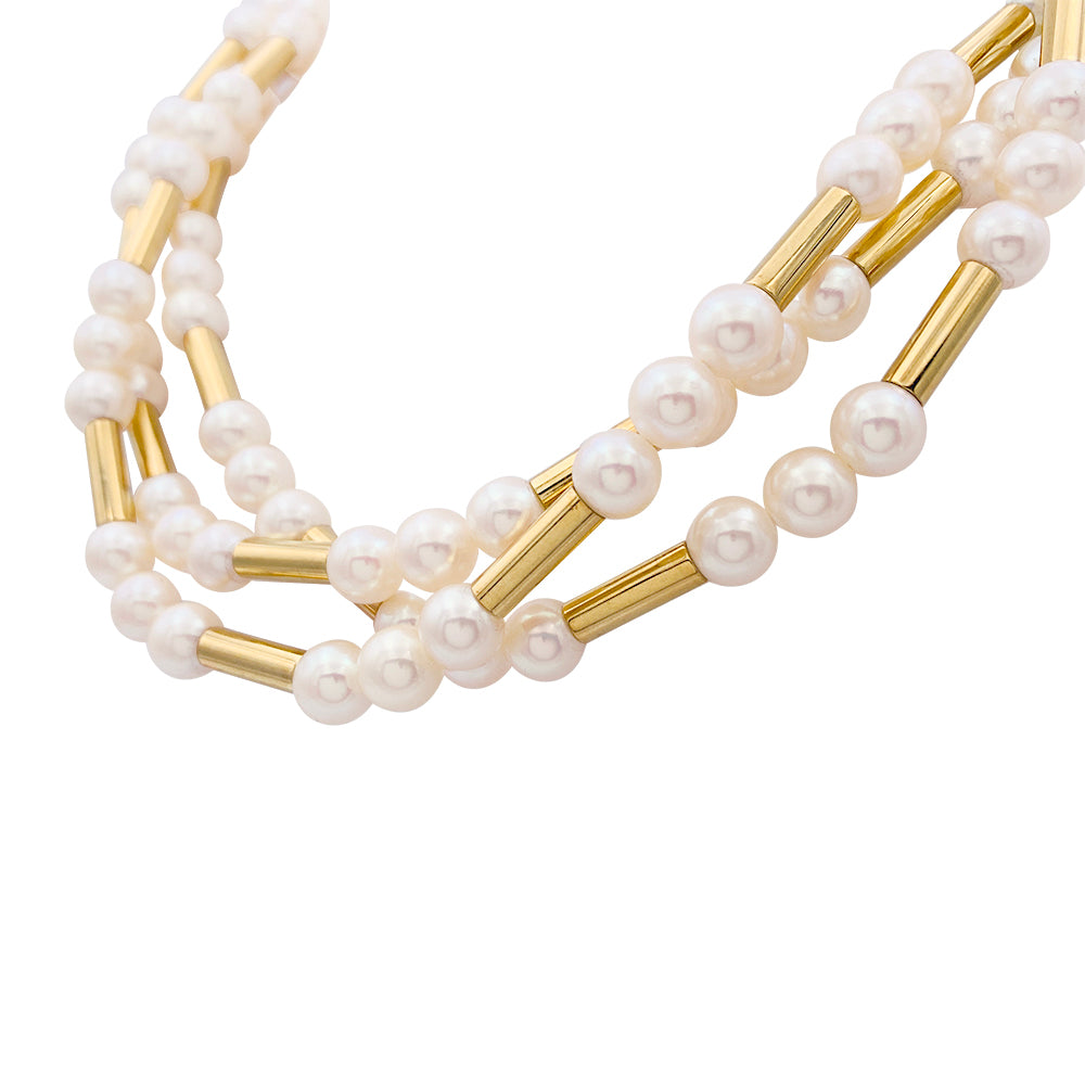 Poiray necklace, "Roseau" model, yellow gold, pearls.