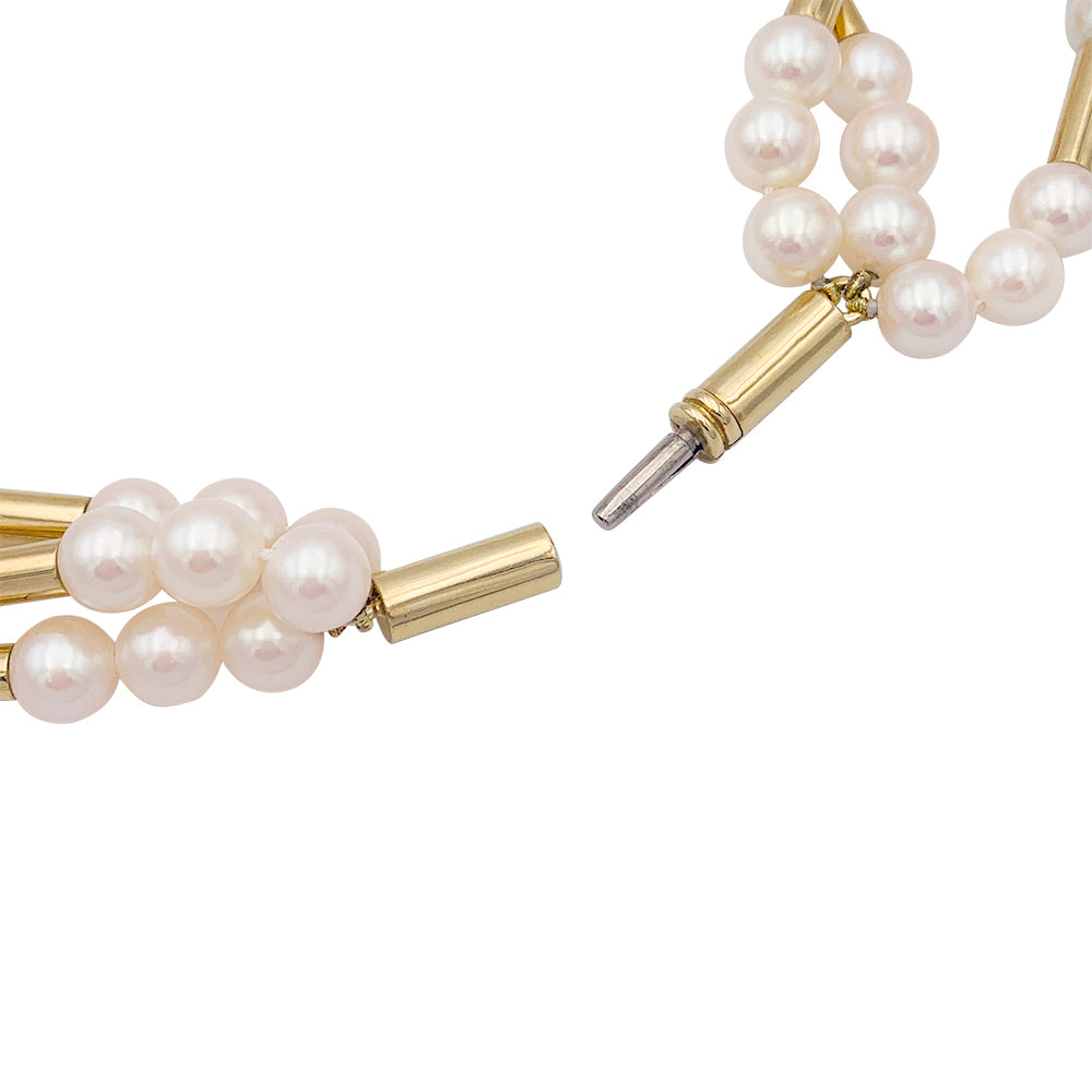 Poiray necklace, "Roseau" model, yellow gold, pearls.