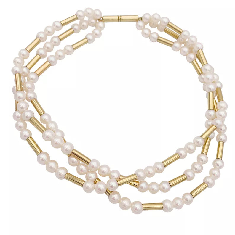 Poiray necklace, "Roseau" model, yellow gold, pearls.