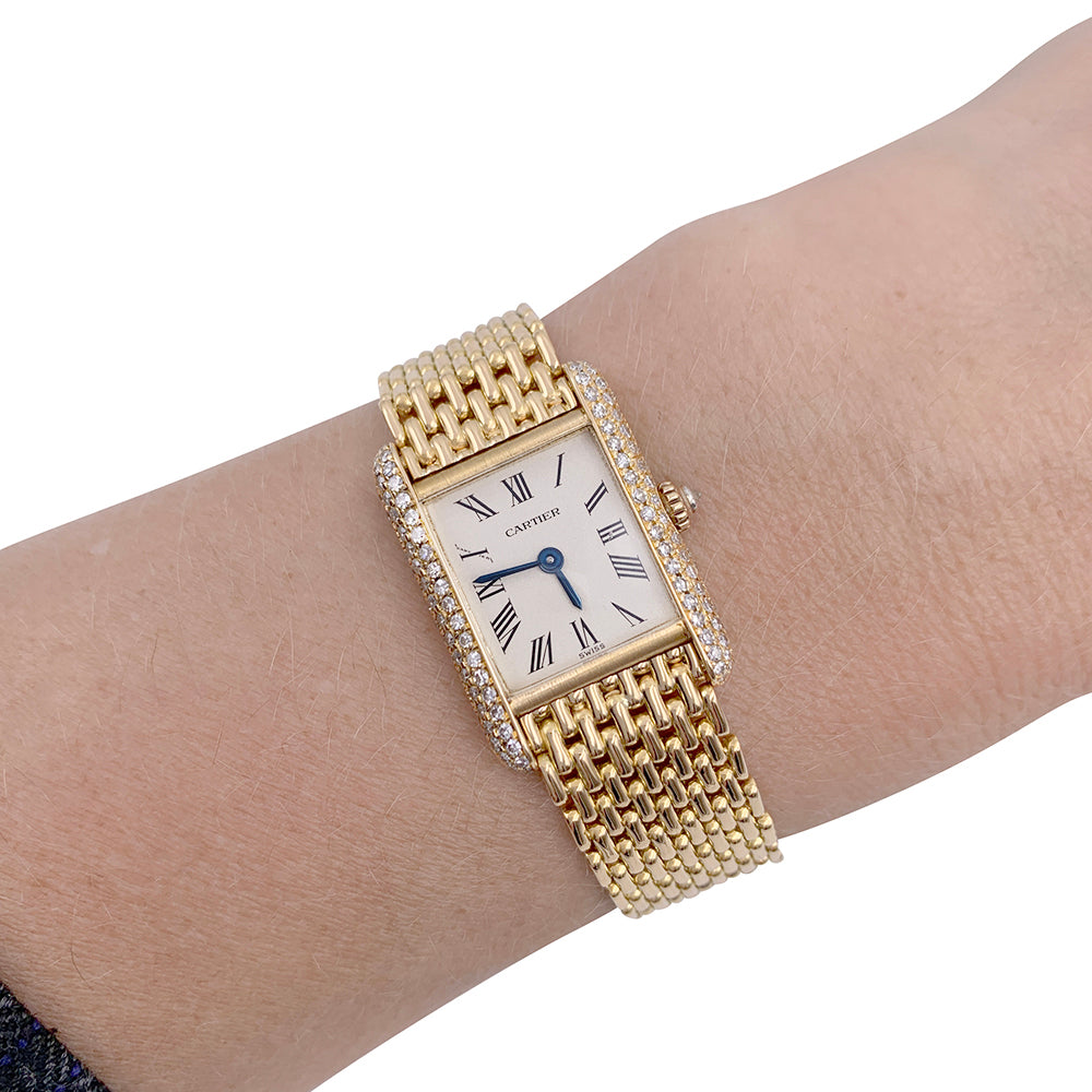 Cartier "Tank Louis Cartier" watch, yellow gold and diamonds.