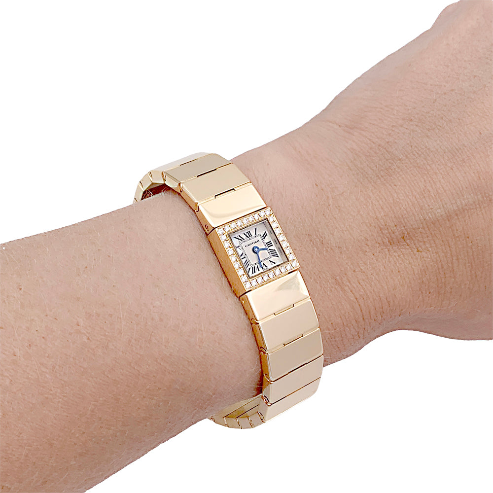 Cartier watch, "Tank Lingot", yellow gold, diamonds.