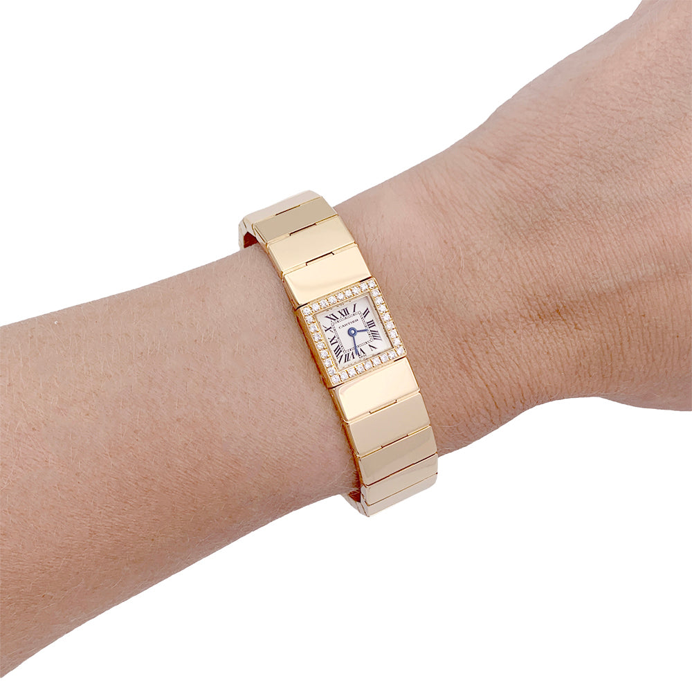 Cartier watch, "Tank Lingot", yellow gold, diamonds.
