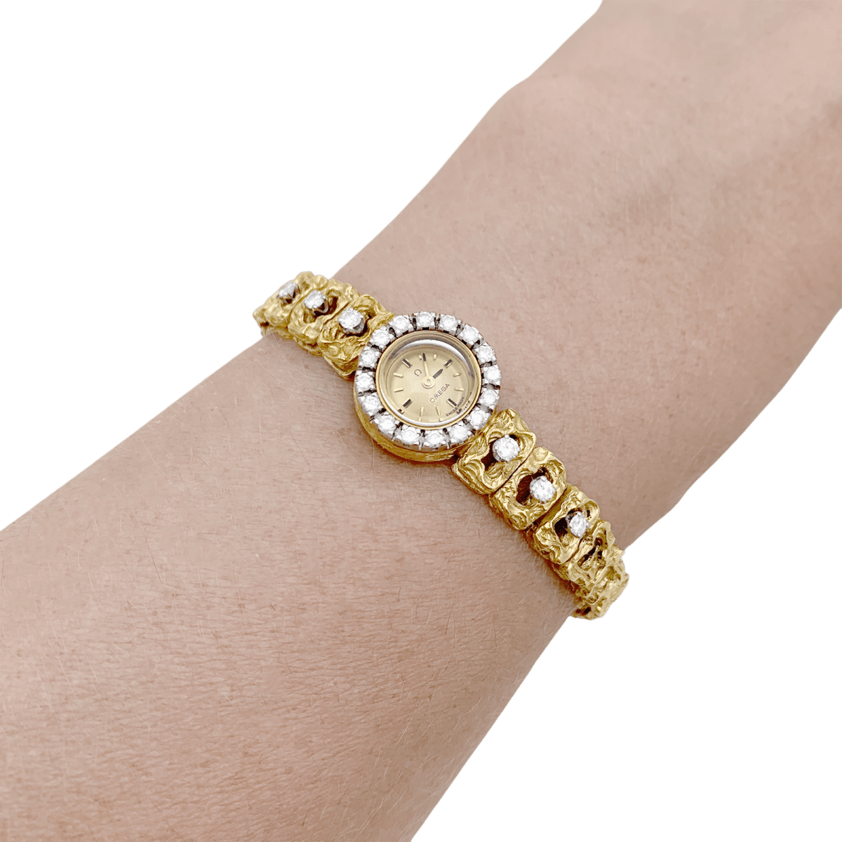 Montre de dame Omega vintage, deux ors, diamants. - Maison Eloe