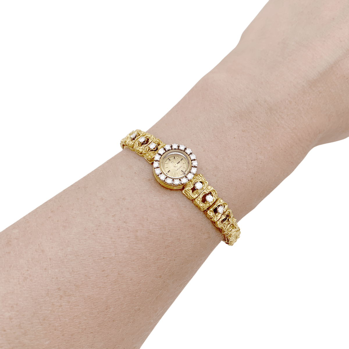 Montre de dame Omega vintage, deux ors, diamants. - Maison Eloe